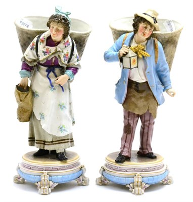Lot 119 - Pair of late 19th century Continental figures modelled as a male and female with basket, height...