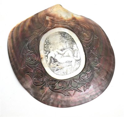 Lot 129 - A 19th century shell depicting a nude figural scene, height 17cm