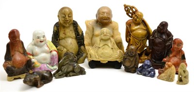 Lot 136 - Collection of 19th century and later stone, hardwood and ceramic Buddhas