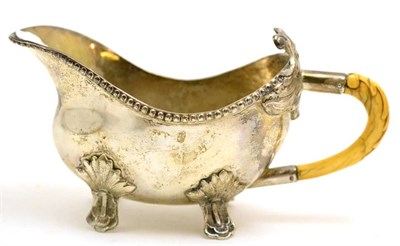 Lot 162 - 19th century sauce boat with ivory handle, stamped '830'