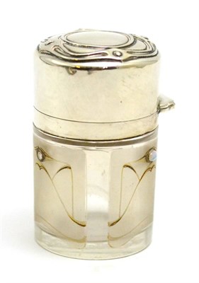 Lot 167 - An Art Nouveau silver topped jar, height 9cm