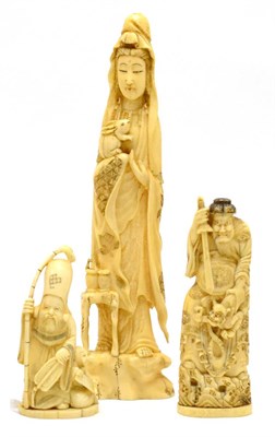 Lot 174 - A late 19th century Japanese carved ivory figure of a lady in full dress holding a rabbit, a...