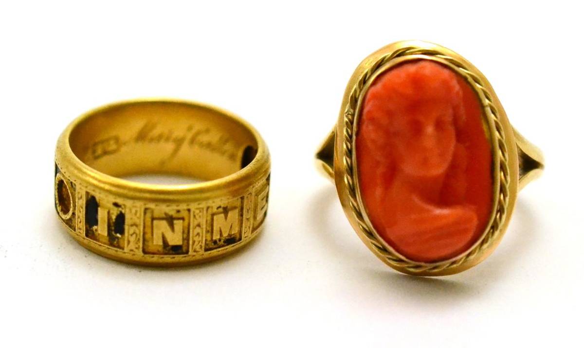 Lot 202 - # A 9ct gold coral cameo ring, a portrait within a rope twist frame, finger size L and an 18ct gold