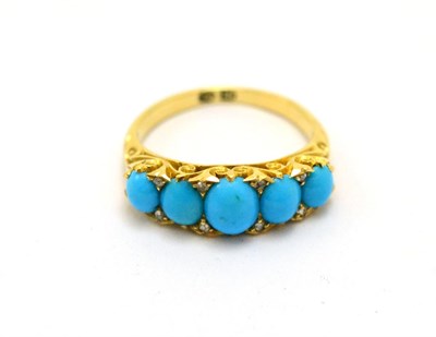 Lot 219 - # A Victorian turquoise and diamond ring, five graduated oval cabochon turquoise spaced by pairs of