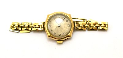 Lot 220 - A lady's 9ct gold wristwatch, signed Rolex, 1923, lever movement signed, silvered dial with...
