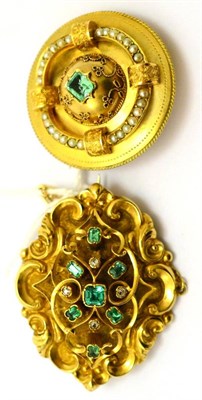Lot 228 - # A Victorian emerald and diamond set brooch with foliate and scroll decoration, measures 5.5cm...