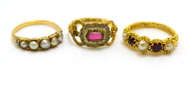 Lot 233 - # Three 19th century rings, including; an 18ct gold ring with pink centre panel and floral...