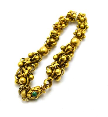 Lot 239 - # A bracelet of fancy bead and loop links with turquoise set clasp (one stone missing), length 18cm