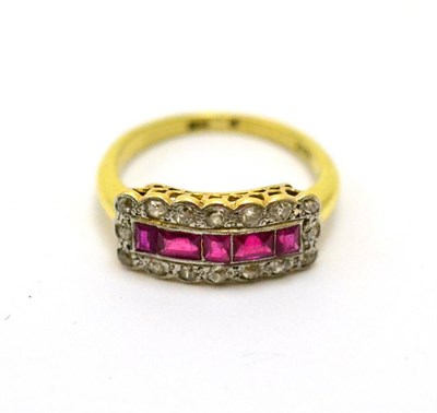Lot 242 - A ruby and diamond ring, the calibré cut rubies within a border of diamonds, finger size Q
