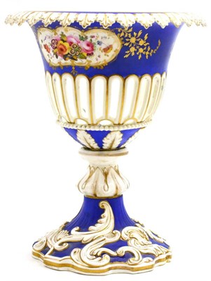 Lot 265 - A Chamberlain Worcester blue ground and floral decorated campana shaped pedestal vase, 33cm high
