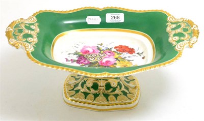 Lot 268 - A shaped oval comport with two handles and floral painted centre