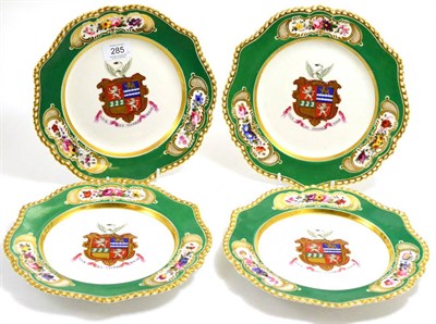 Lot 285 - A set of four armorial plates, painted with shield shaped arms with swan crest