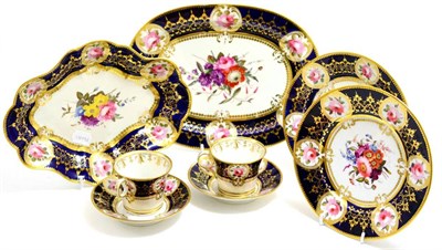 Lot 288 - A Chamberlain Worcester shaped oval dessert dish with a floral painted centre and blue and gilt...