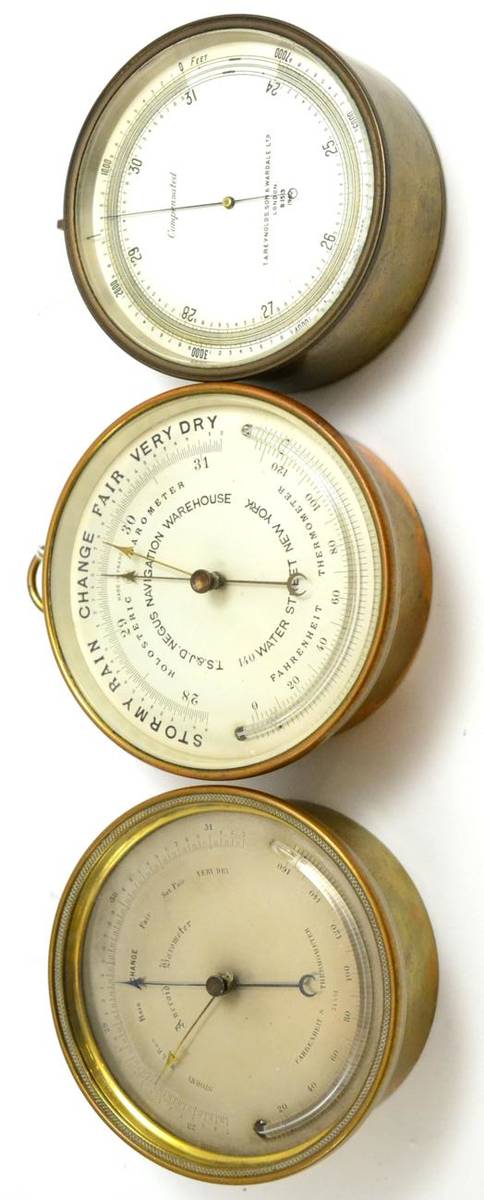 Lot 299 - Three brass cased aneroid barometers, 4-1/2-inch silvered dial signed Holosteric barometer...