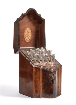 Lot 302 - A George III mahogany serpentine knife box and a quantity of silver plated cutlery