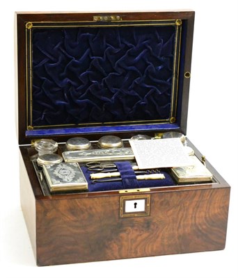 Lot 303 - Victorian walnut dressing case with silver plated mounts