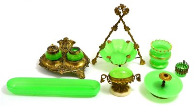 Lot 309 - A collection of 19th century green opaline glass, mainly metal mounted, comprising: watch...