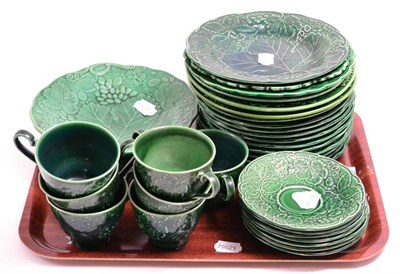 Lot 315 - A group of Wedgwood and other Majolica leaf plates, tea cups and saucers (32 pieces)