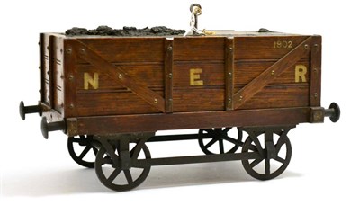 Lot 318 - An Edwardian oak cigar/cigarette box in the form of a North Eastern Railways coal wagon, 1902,...
