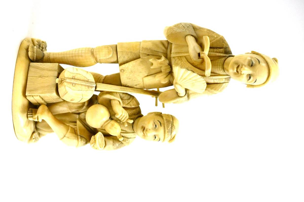 Lot 327 - Late 19th century Japanese ivory figural group
