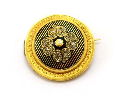 Lot 347 - # A Victorian brooch, the circular form with rose cut diamond quatrefoil motif centrally, and black