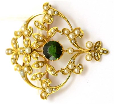 Lot 365 - # An early 20th century green tourmaline and seed pearl set brooch with optional pendant...