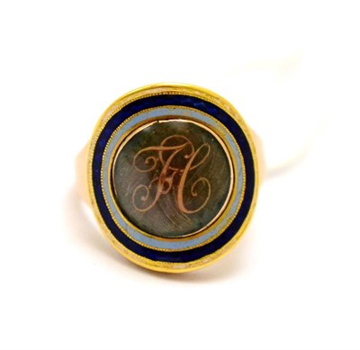 Lot 374 - # A Georgian mourning ring, with plaited hair and grey, blue and white enamel, initials 'FC'...