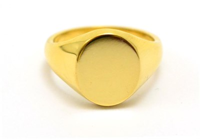 Lot 388 - An 18ct gold signet ring, the plain polished head on integral shank, finger size W1/2