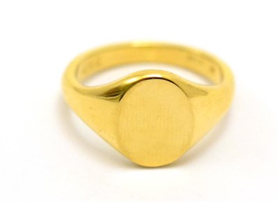 Lot 389 - An 18ct gold signet ring, the plain polished head on integral shank, finger size S