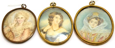 Lot 395 - A group of three 19th century portrait miniatures on ivory, one signed E T B, one signed E G...