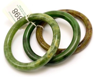 Lot 398 - Three jadeite bangles