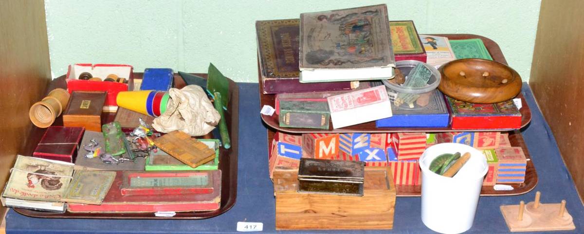 Lot 417 - A collection of toys including building blocks, Bezique markers, playing cards, boxed games...