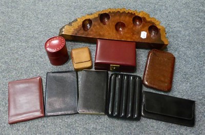 Lot 431 - A vintage large burrwood pipe stand from Kirby, Read & Co, Paris, two leather cigar cases,...