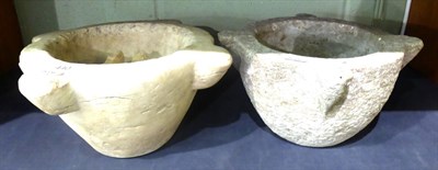 Lot 440 - A large marble mortar and a composite mortar, diameter 33cm and 31cm respectively