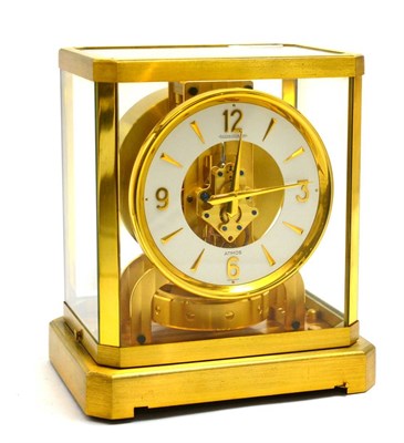 Lot 443 - An atmos clock, signed Jaeger LeCoultre, 20th century, white chapter ring with dagger and...
