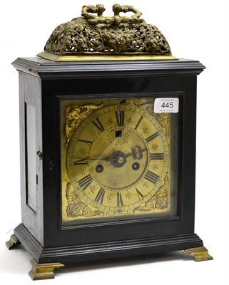 Lot 445 - An ebony veneered striking table clock, pieced basket top case with a carrying handle, glazed...