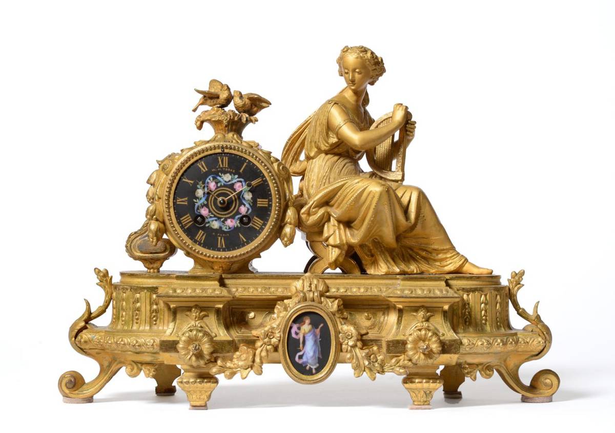 Lot 448 - A gilt metal striking mantel clock, retailed by W.H.Tooke a Paris, circa 1880, case depicting a...