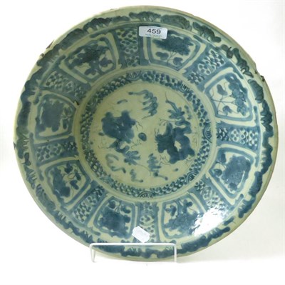 Lot 459 - A Chinese provincial porcelain charger painted in underglaze blue in Kraak porcelain style