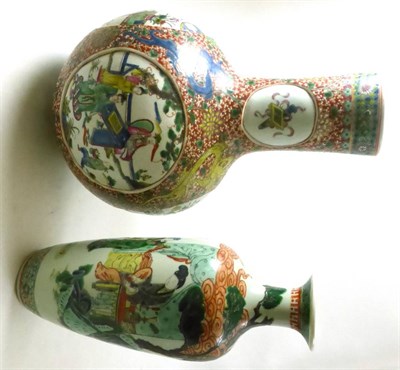 Lot 473 - A Chinese porcelain bottle vase, bears Kangxi reign mark, painted in famille verte enamels with...