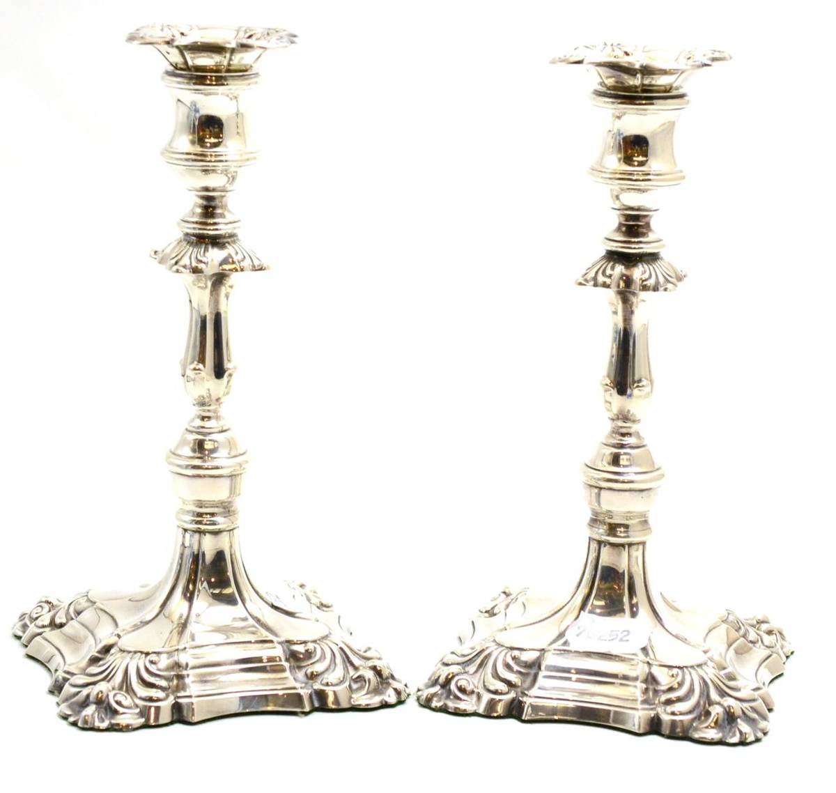 Lot 477 - A pair of 20th century silver candlesticks in the George II style, height 25cm