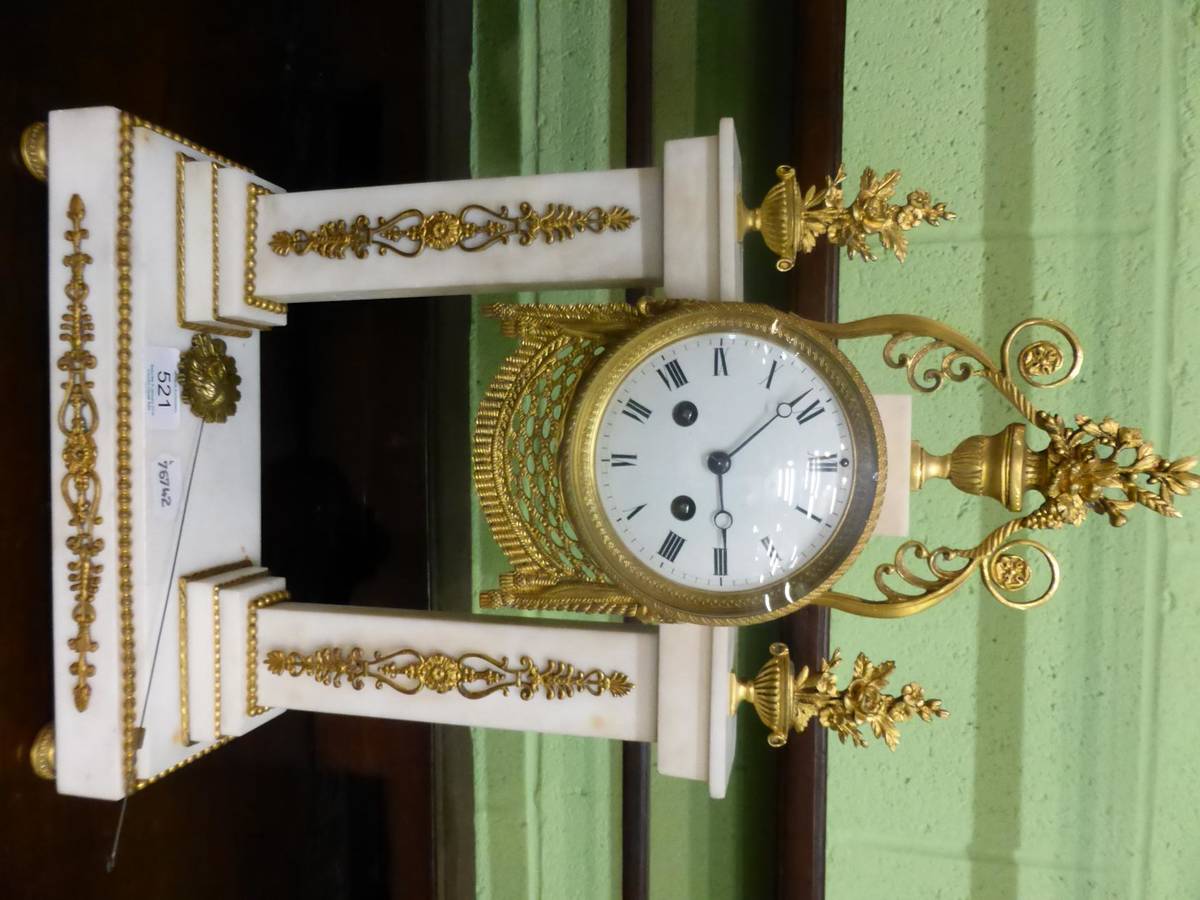 Lot 521 - A white marble portico striking mantel clock, 19th century, floral and scroll gilt metal...