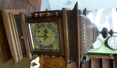 Lot 527 - A quarter striking table clock, circa 1890, the pagoda top with turned finials, side sound fret...