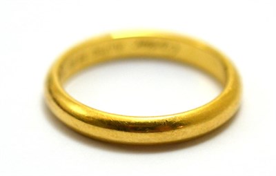 Lot 539 - An 18ct gold wedding band, by Cartier, finger size Q1/2 in a Cartier box with documents