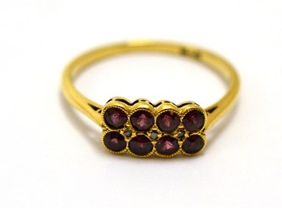 Lot 541 - A ruby and diamond two row ring, eight round rubies with rose cut diamond accents, in yellow...