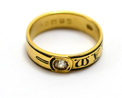 Lot 543 - An 18ct gold mourning ring, the band enamelled in black to read 'IN MEMORIAM', set with an old...