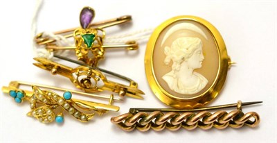 Lot 551 - # Six brooches; an emerald set brooch, a turquoise and seed pearls bar brooch, an amethyst and seed