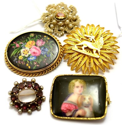 Lot 564 - # Five brooches, including; a mourning brooch, set with foil backed garnets and pearls,...