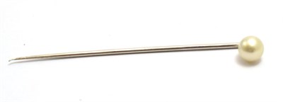 Lot 569 - A cultured pearl tie pin, the single pearl on a plain white pin   NB the pearl has not been...