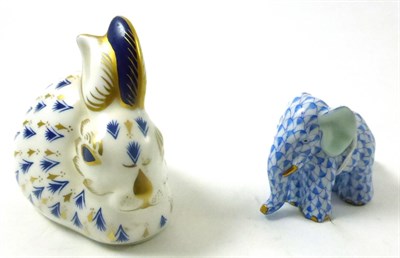 Lot 576 - Herend blue decorated model of an elephant and Royal Crown Derby rabbit paperweight in blue and...