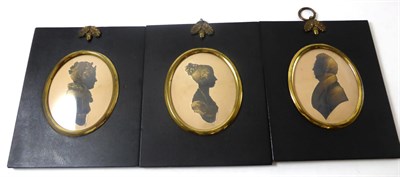 Lot 598 - Three 19th century oval silhouette portraits, height 9cm each